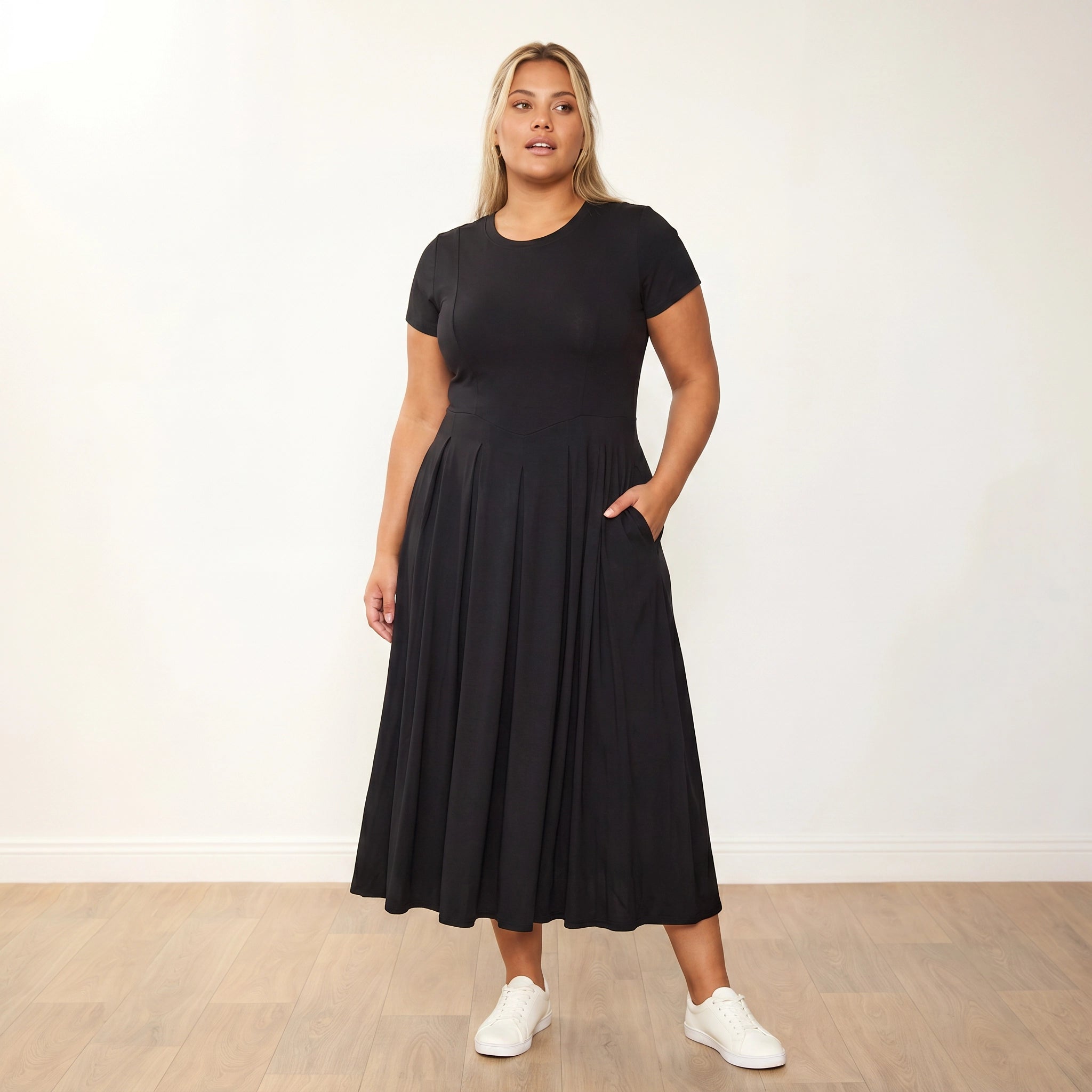 Polly Dress Black - Plus Size Model XXL, front one hand in pocket