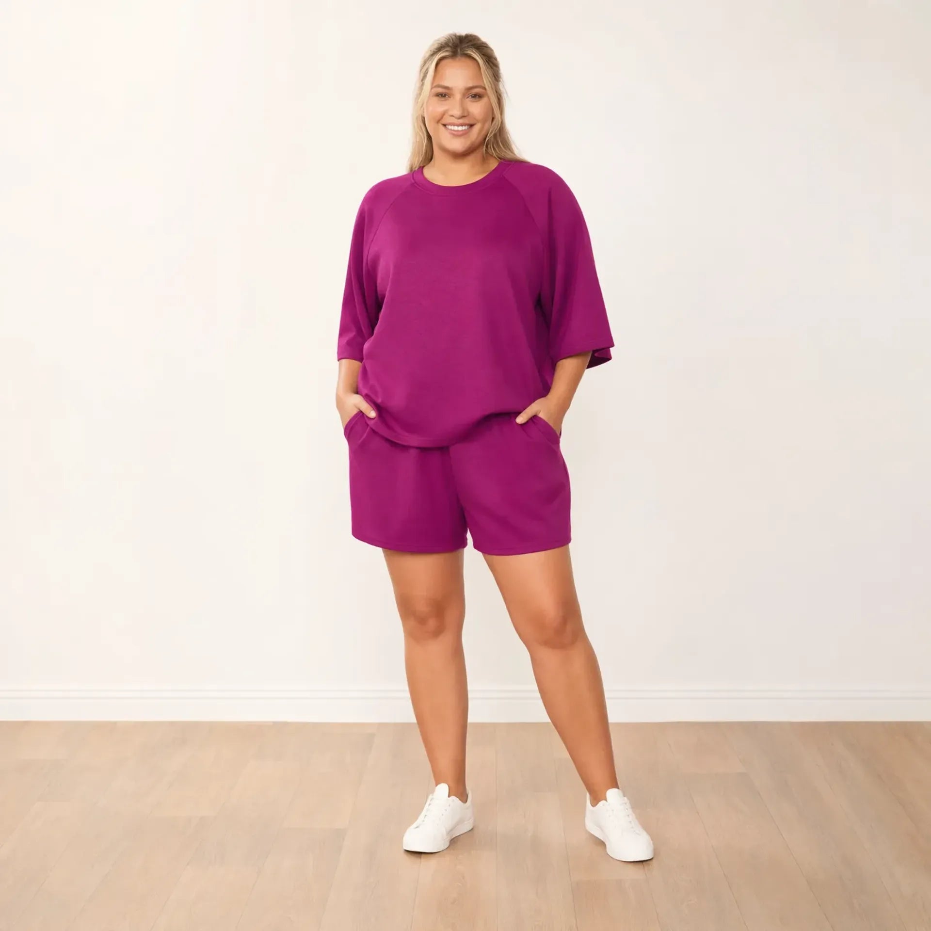 Suki Set Berry - front hands in pockets, plus size model