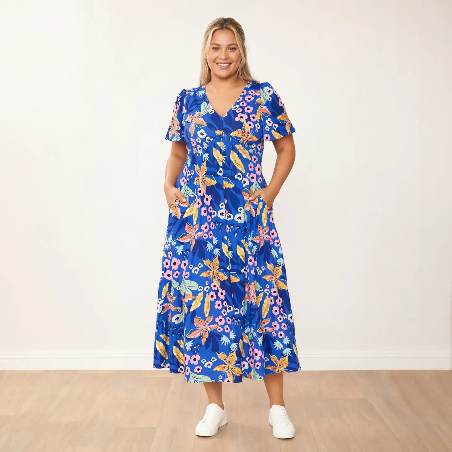 Whitney Dress Navy Floral - plus size front hands in pockets smile