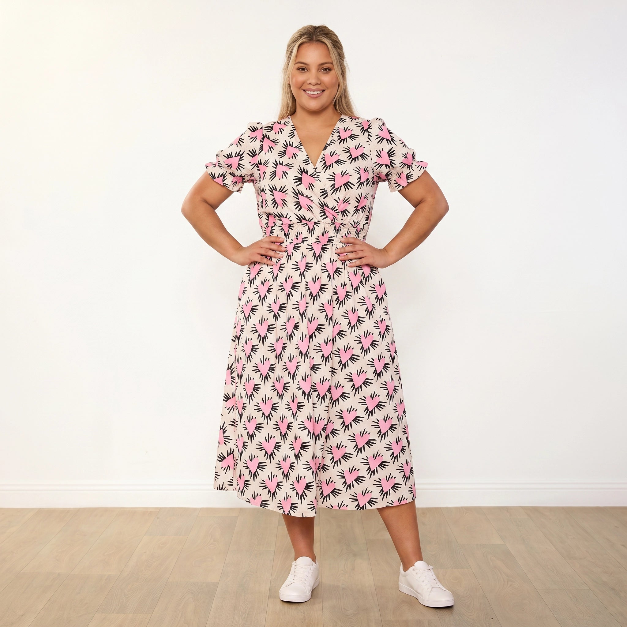 Belle Dress (Pink Heart) - Plus Size Model XXL, hands on hips confident expression
