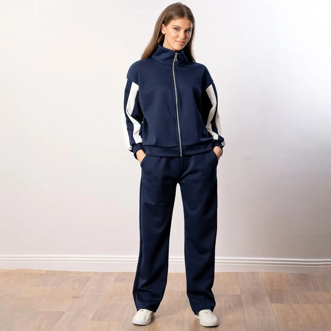 Aubree Co-ord in navy, front view with collar zipped up