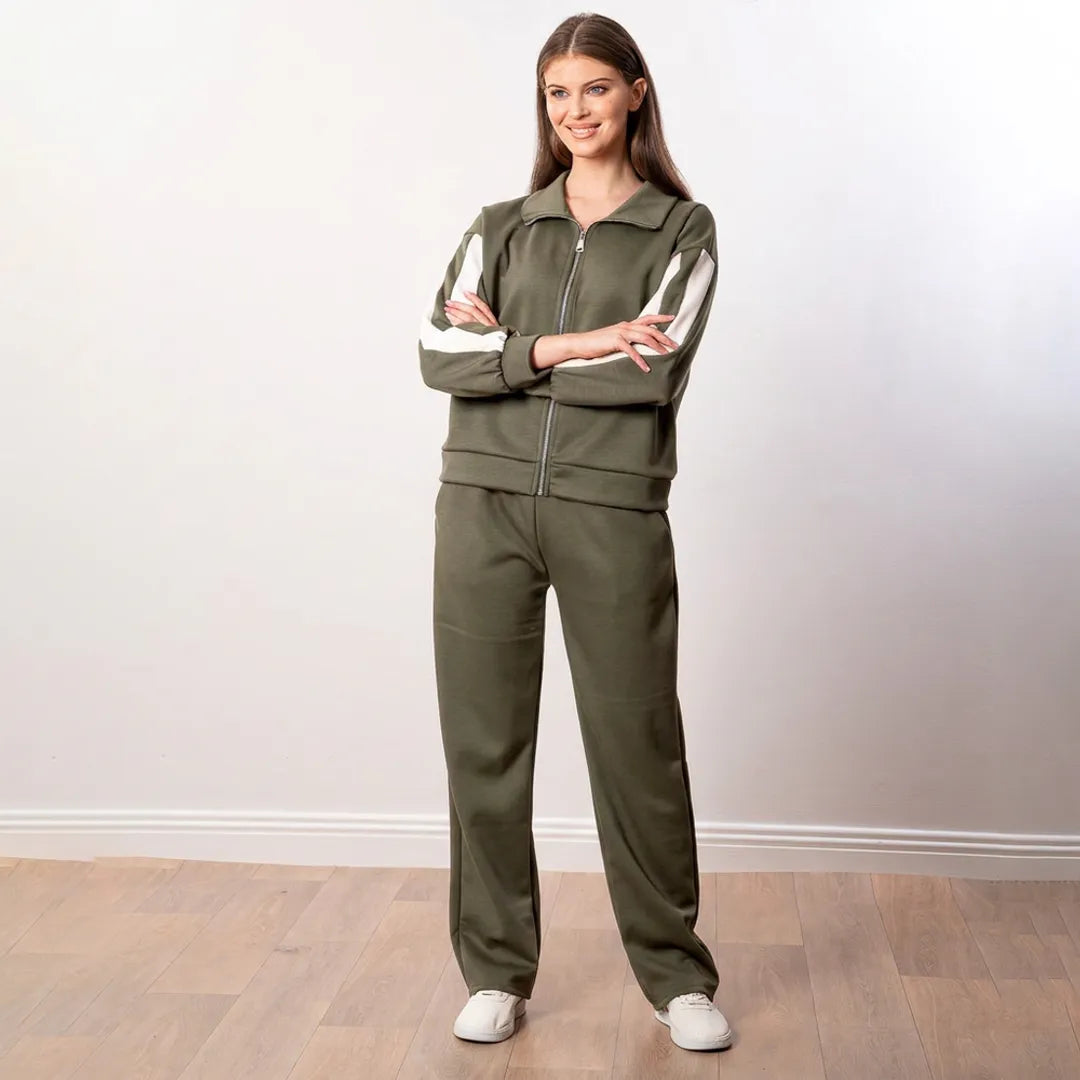 Aubree Co-ord in khaki green, model standing with arms crossed showing cream sleeve stripe detail