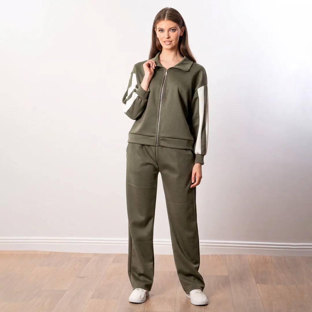 Aubree Co-ord in khaki green, front view with hand raised to the collar showing the silver zip