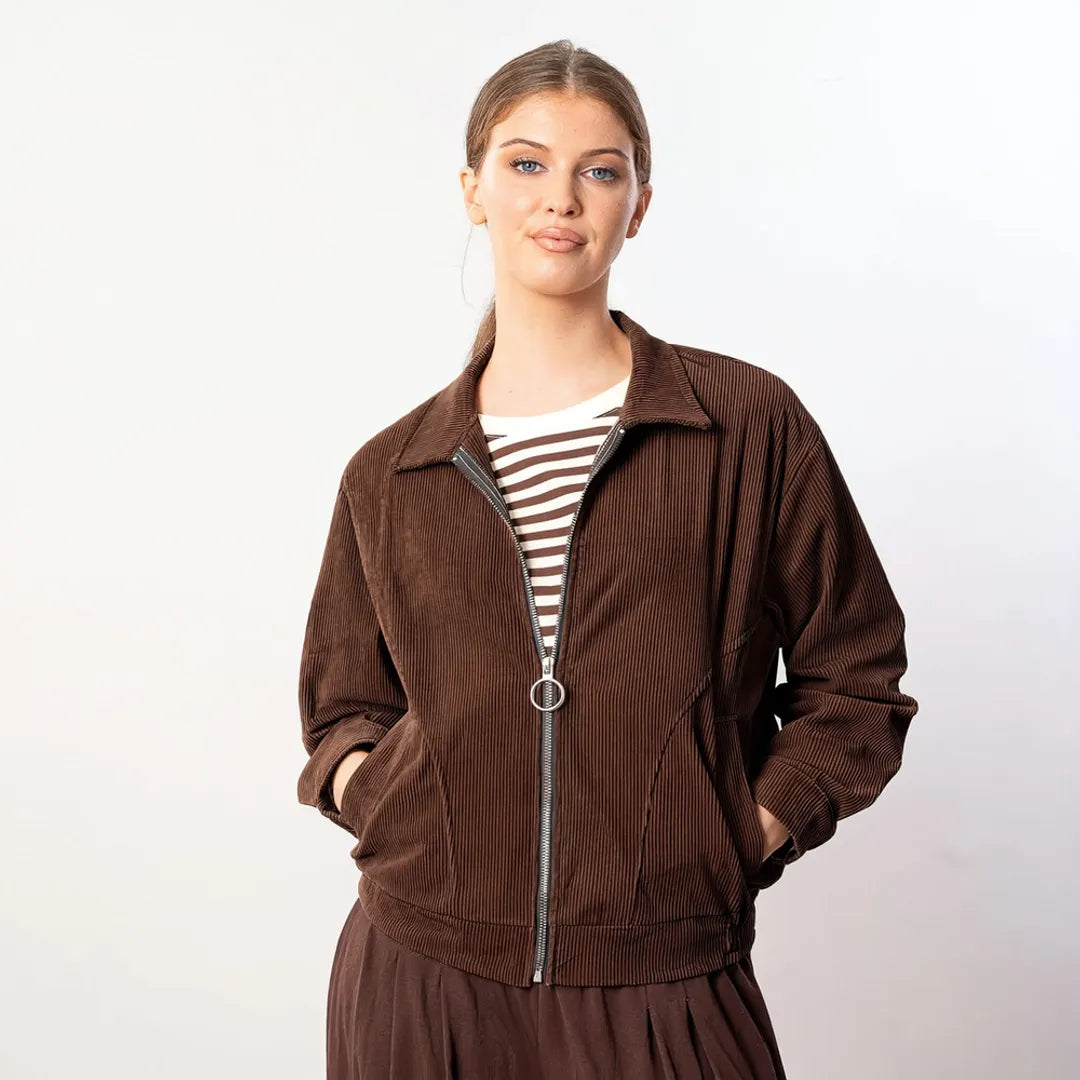 Sydney Jacket in chocolate brown corduroy, front view with hands in pockets