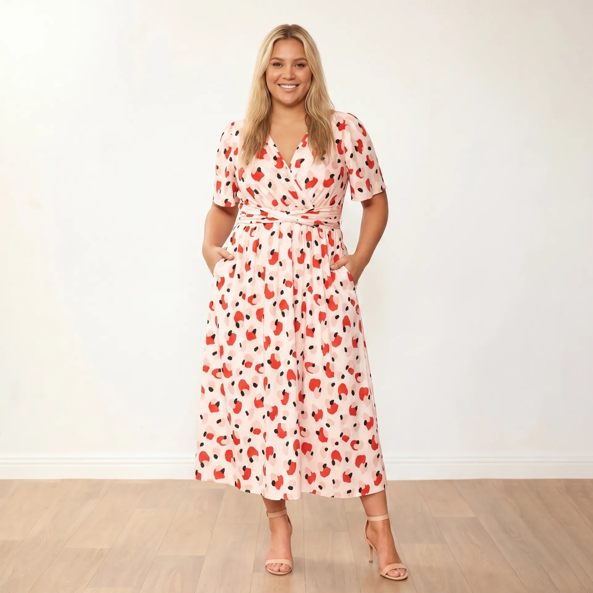 Teagan Dress Peach Abstract on plus-size model - front, hands in pockets