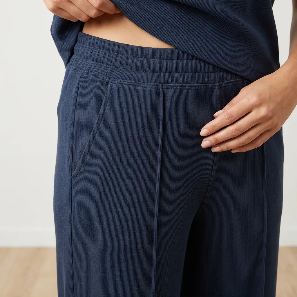 Lily Co-ord in Navy - Trouser elastic waistband, pocket and center pintuck seam close-up