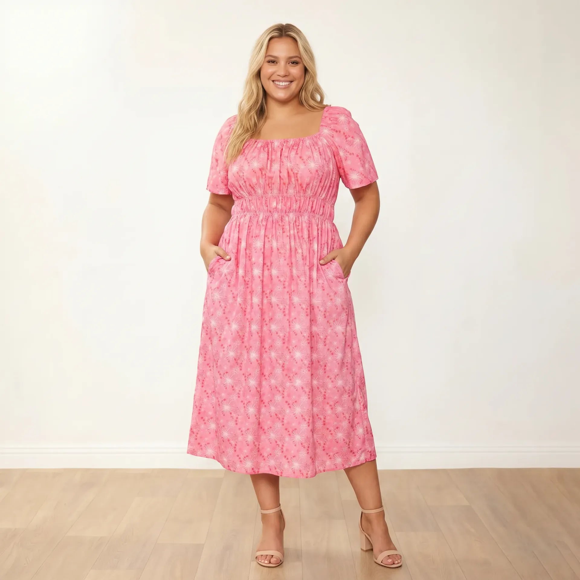 Ciara Dress Pink Star - Plus Size Model XXL - Front hands in pockets big smile