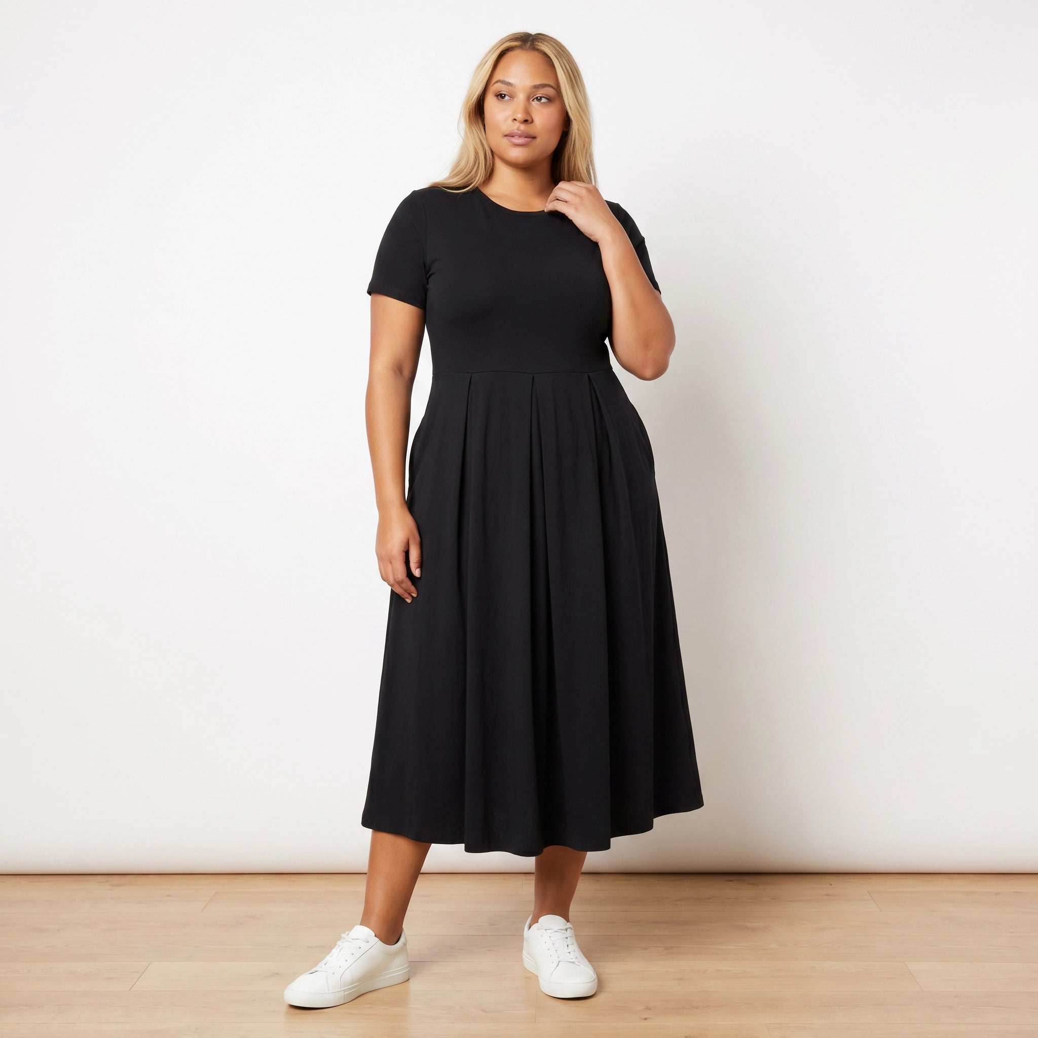 Polly Dress Black - Plus Size Model XXL, front hand at neckline