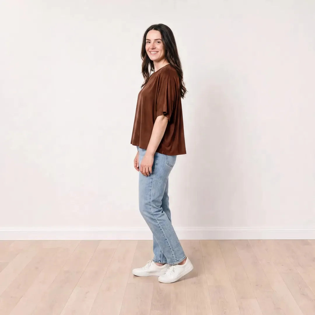 Orla Top in chocolate brown styled with light-wash straight-leg jeans, side view