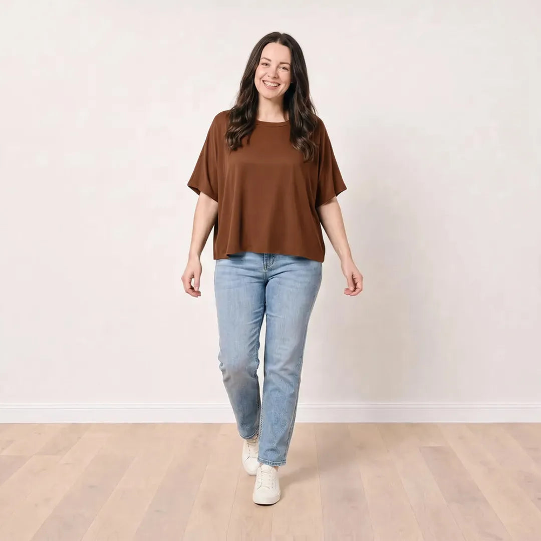 Orla Top in chocolate brown styled with light-wash straight-leg jeans, walking view