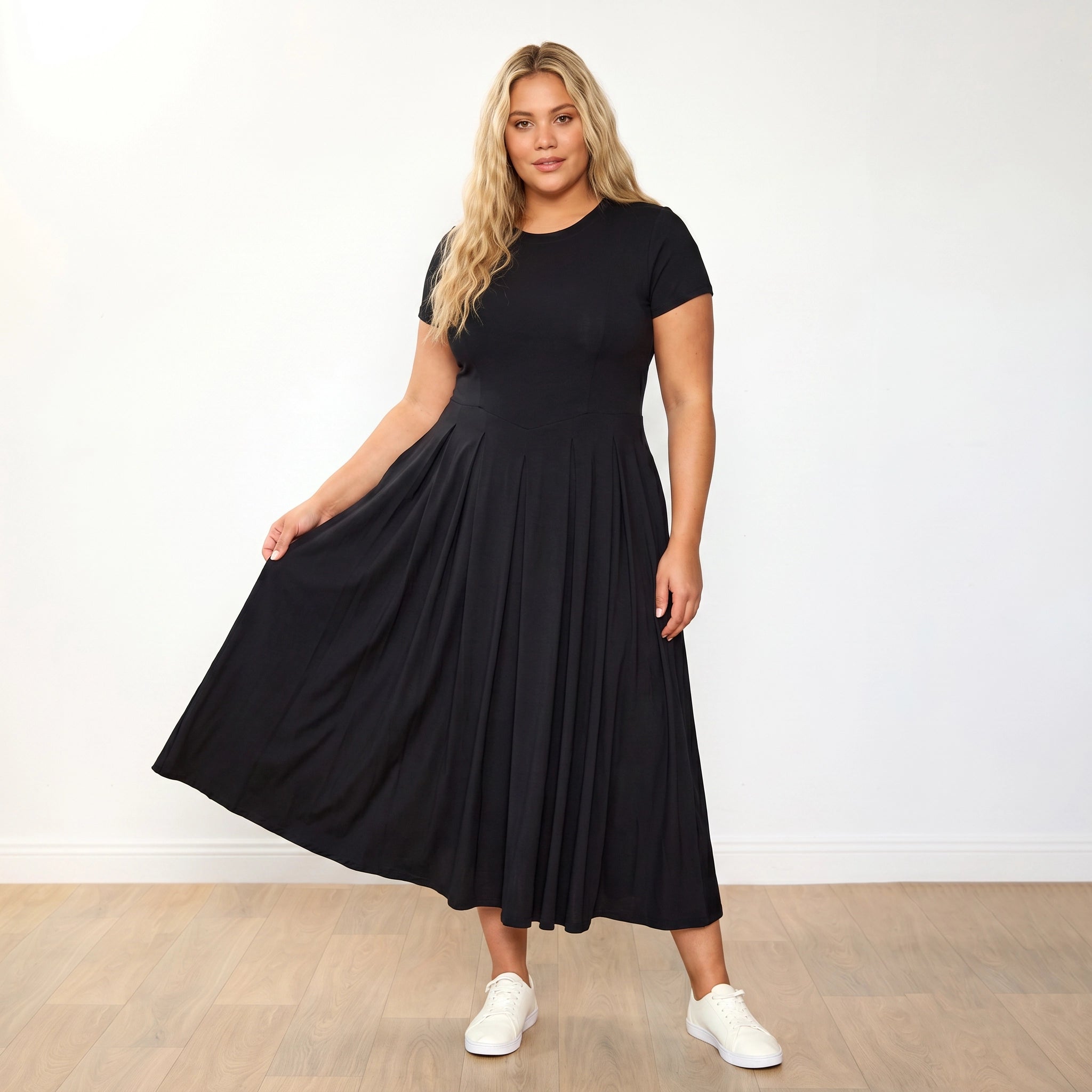 Polly Dress Black - Plus Size Model XXL, 3/4 side profile smiling