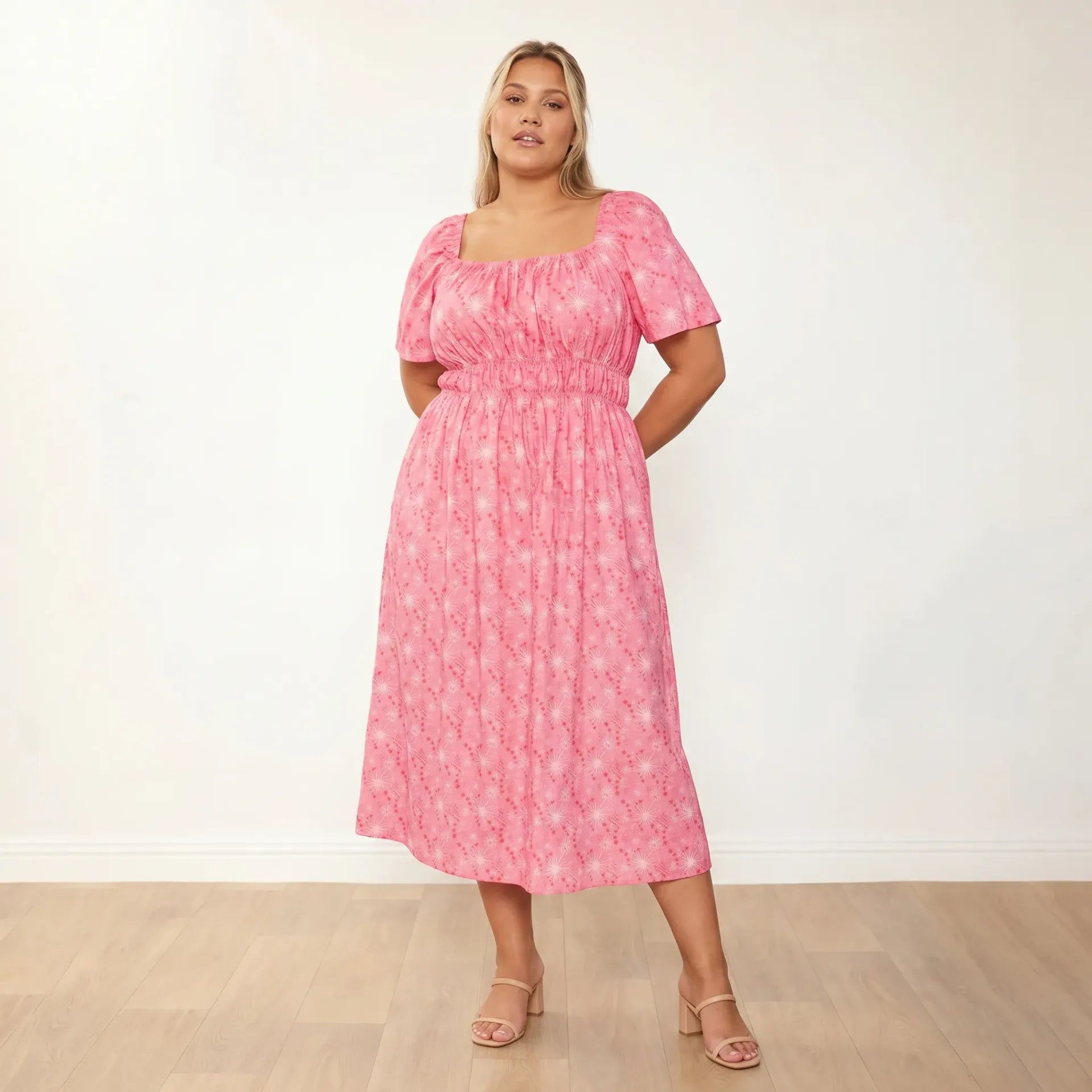 Ciara Dress Pink Star - Plus Size Model XXL - 3/4 side looking over shoulder