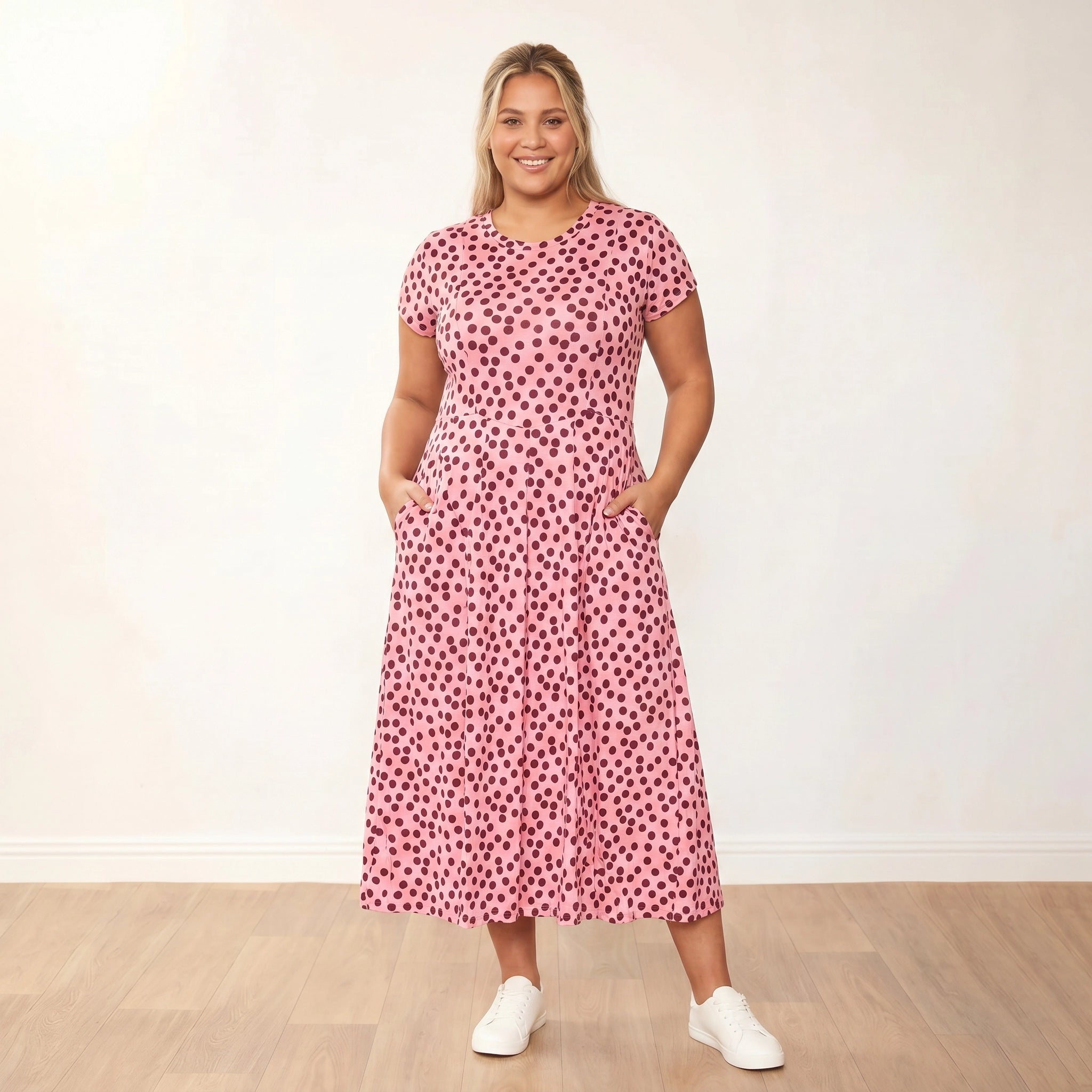 Polly Dress (Polka Dot) - Plus Size XXL - Front, hands in pockets, bright smile