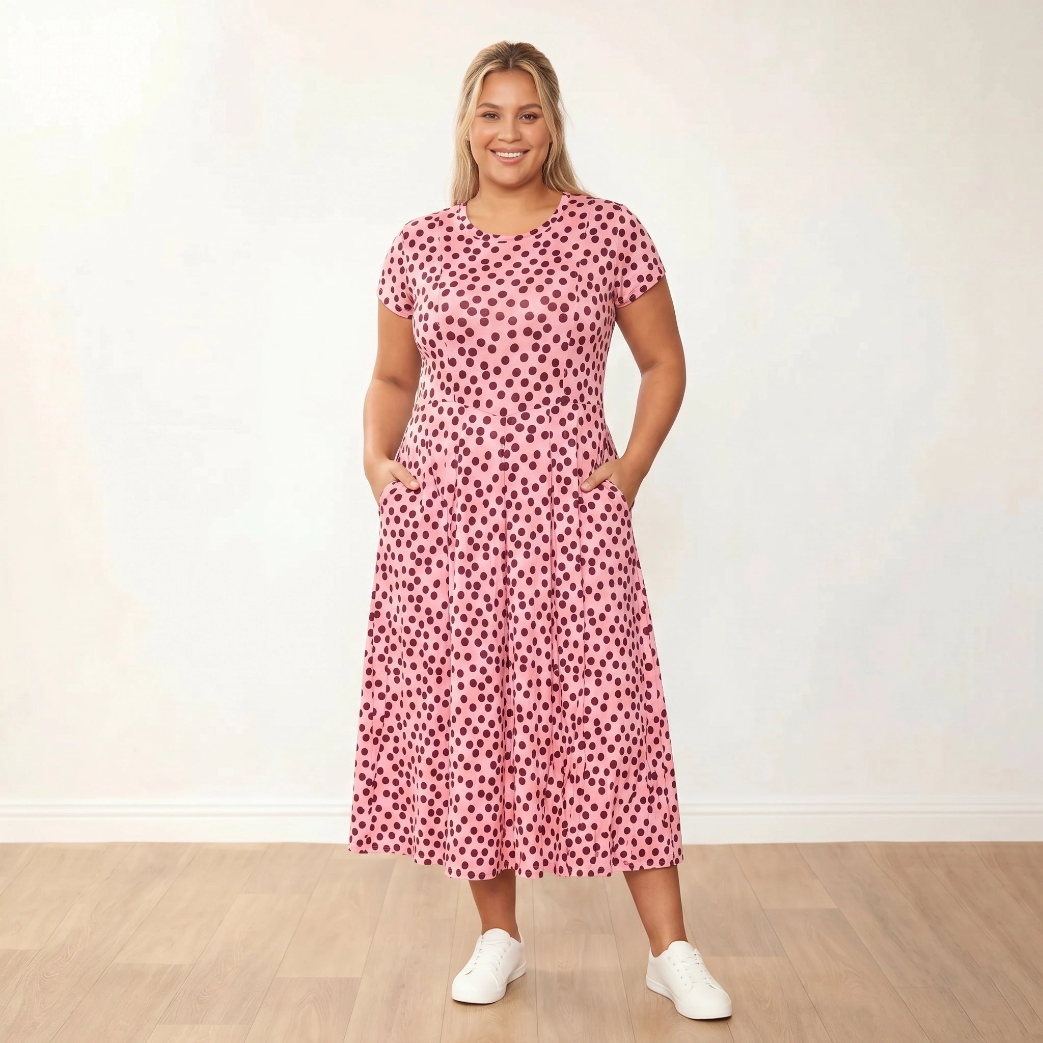 Polly Dress (Polka Dot) - Plus Size XXL - Front, hands in pockets, warm smile