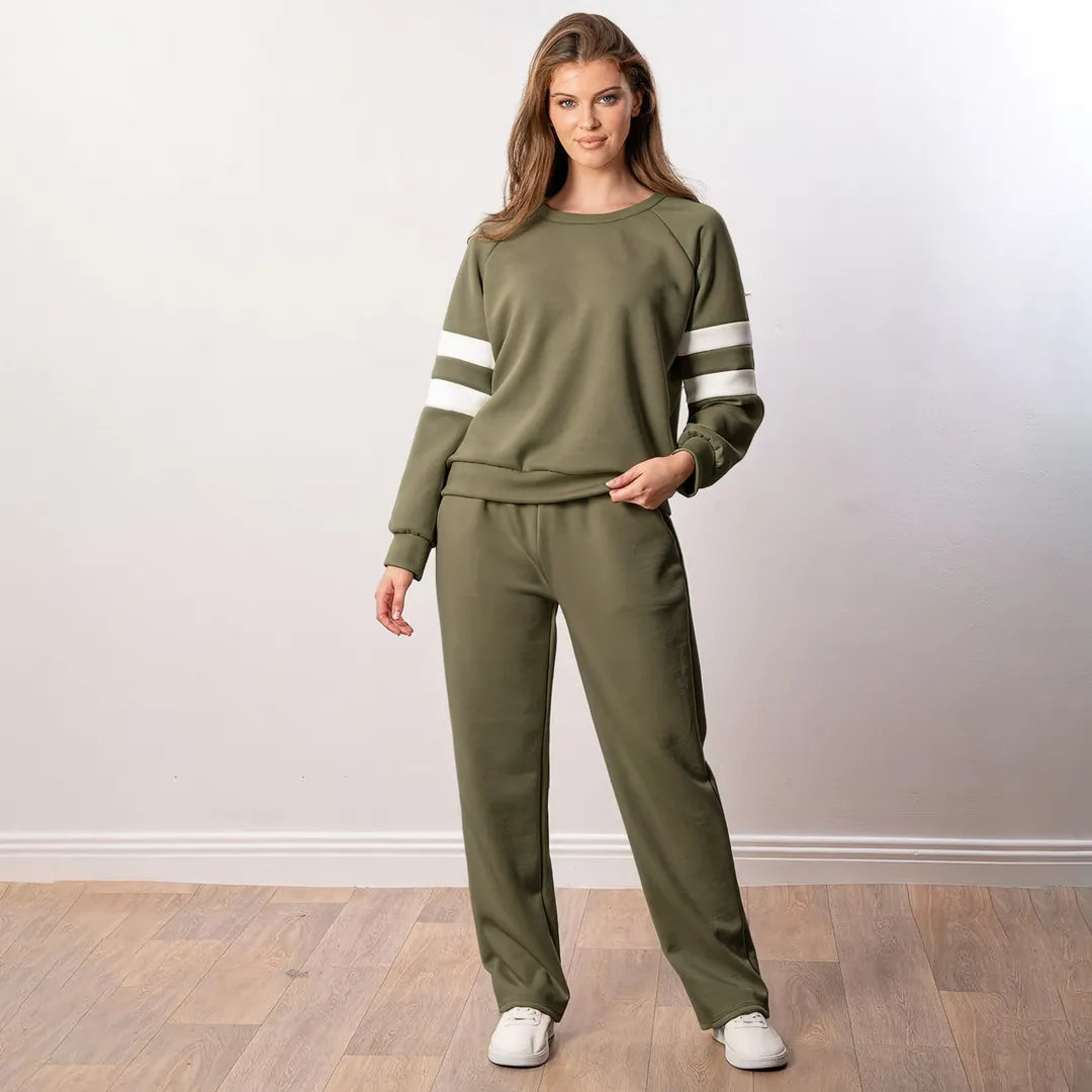 Jasmine Stripe Co-ord in khaki, front view holding hem