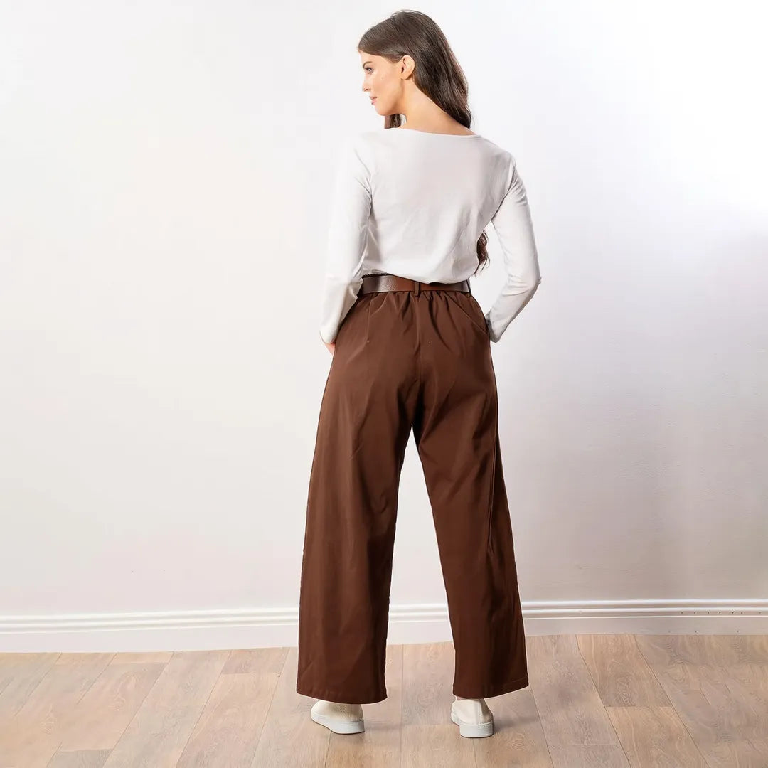 Nora Wide Leg Trousers in brown, back three-quarter view with head turned
