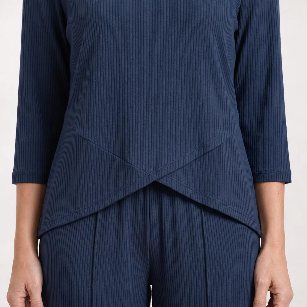 Lily Co-ord in Navy - Asymmetric crossover tulip hem and fine ribbed knit texture close-up