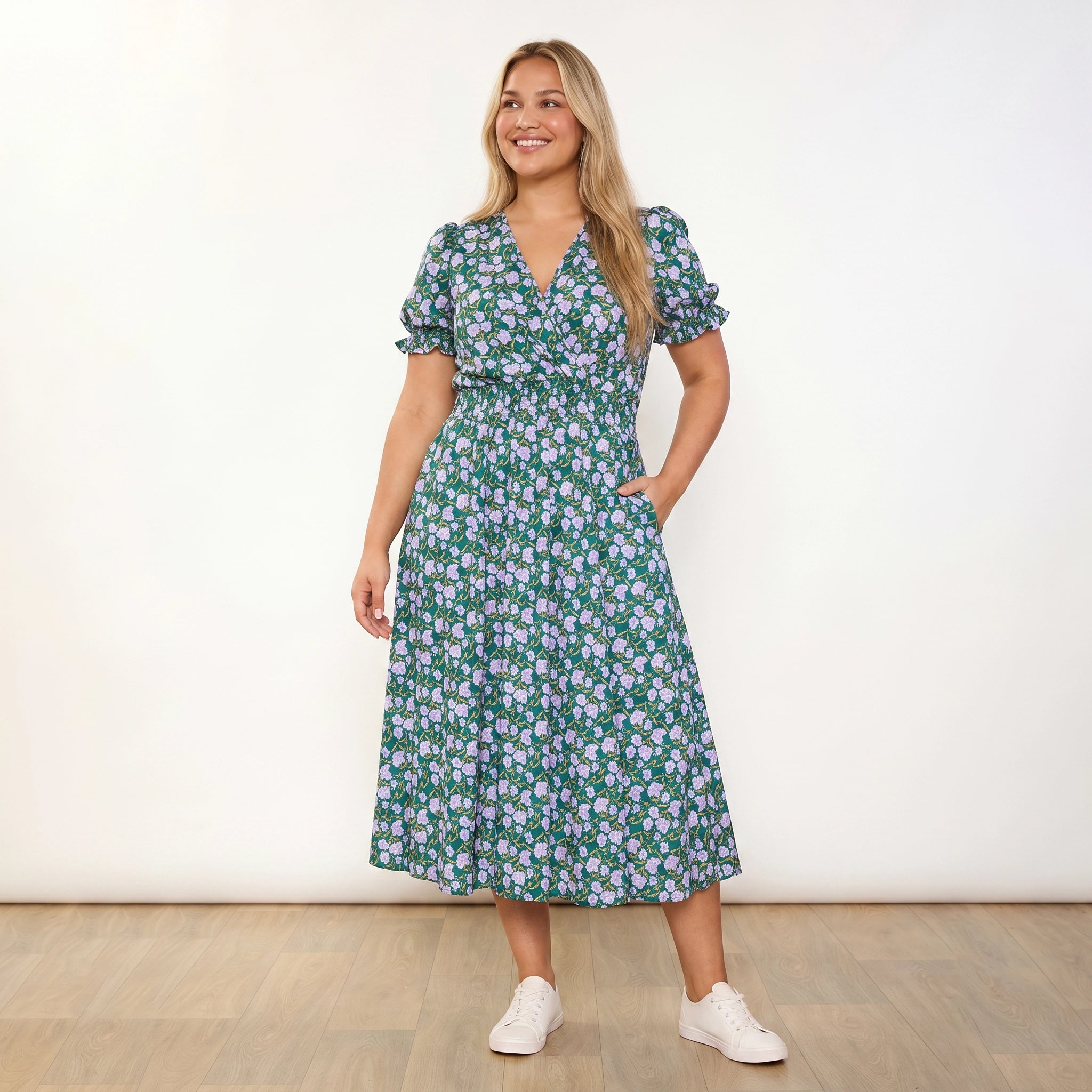 Belle Dress Green Lilac Wildflower - plus size model front, looking away, open smile