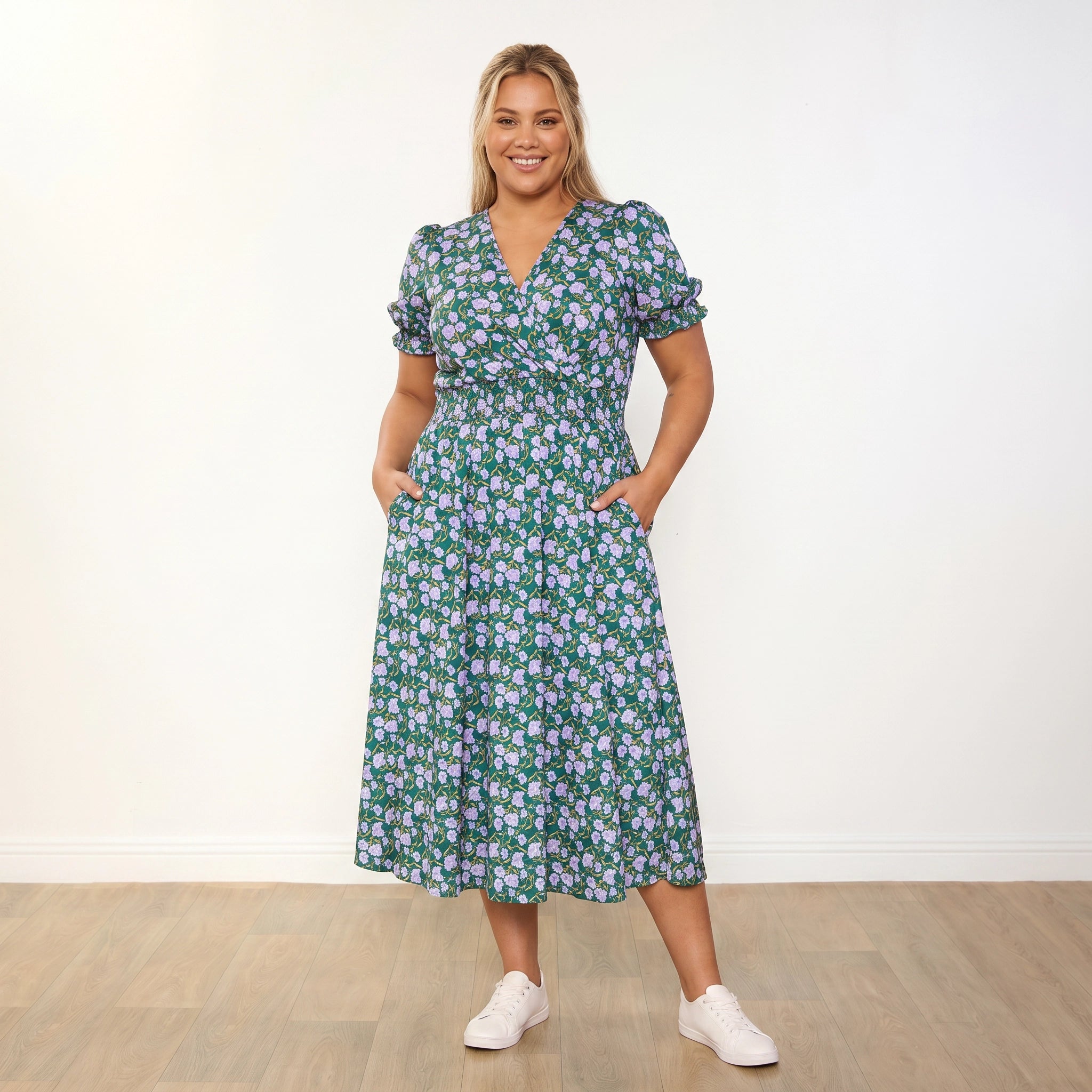Belle Dress Green Lilac Wildflower - plus size model front, open smile, head tilt