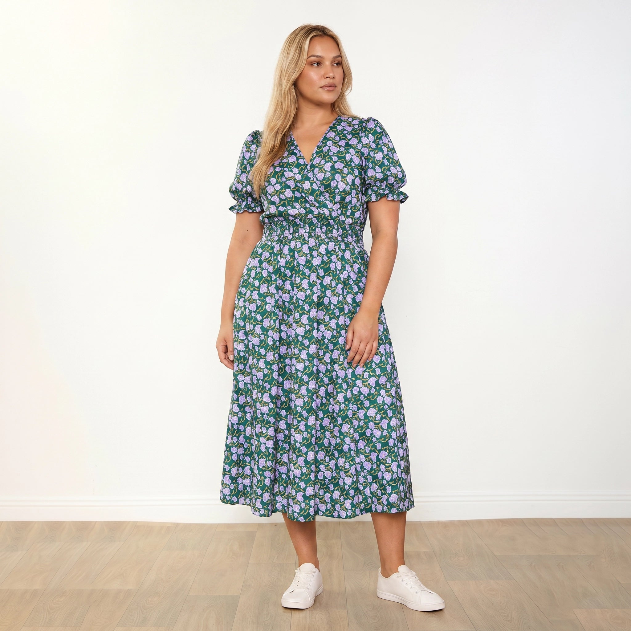 Belle Dress Green Lilac Wildflower - plus size model front, arms relaxed, looking right