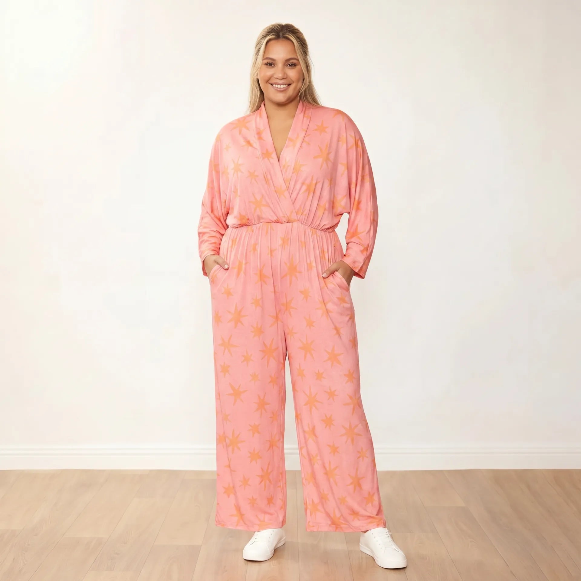 Vogue Jumpsuit Peach Star - Plus Size Model XXL - Front hands in pockets
