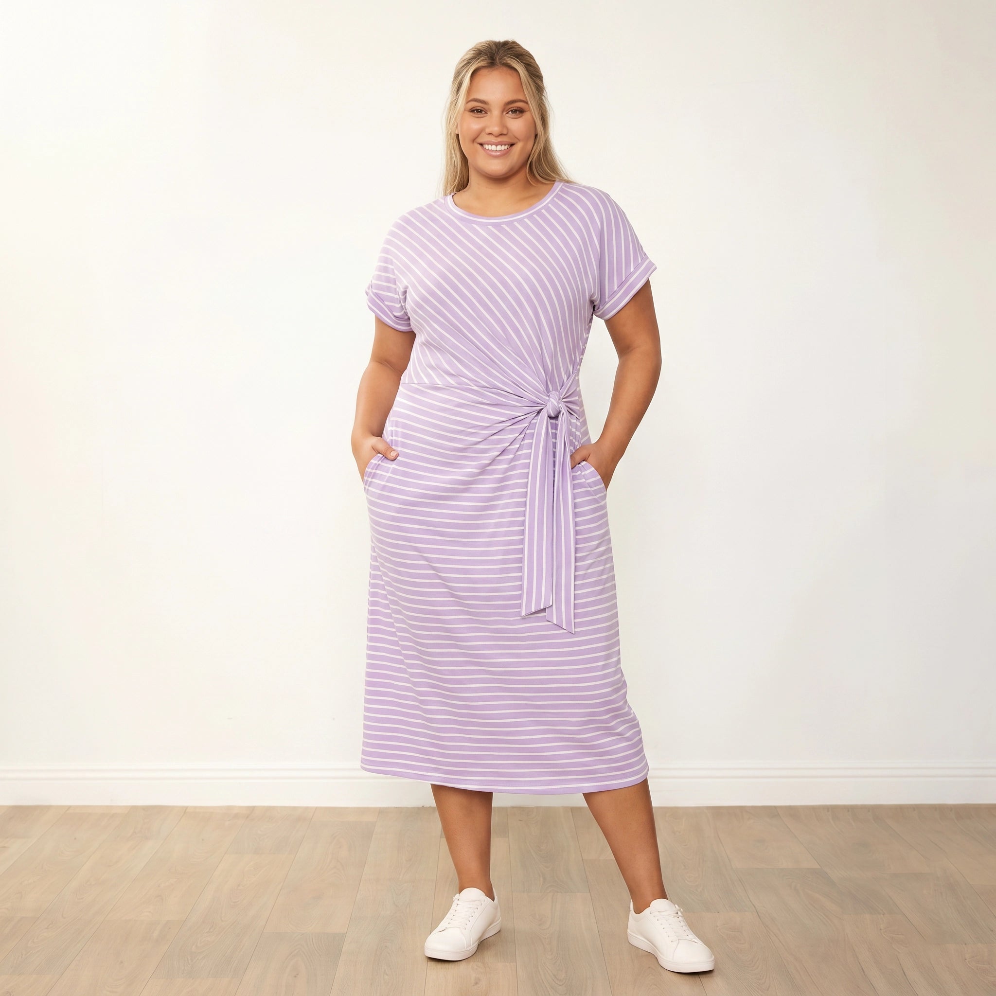 Muriel Dress (Lilac Stripe) - Plus Size XXL - Front, hands in pockets, warm smile