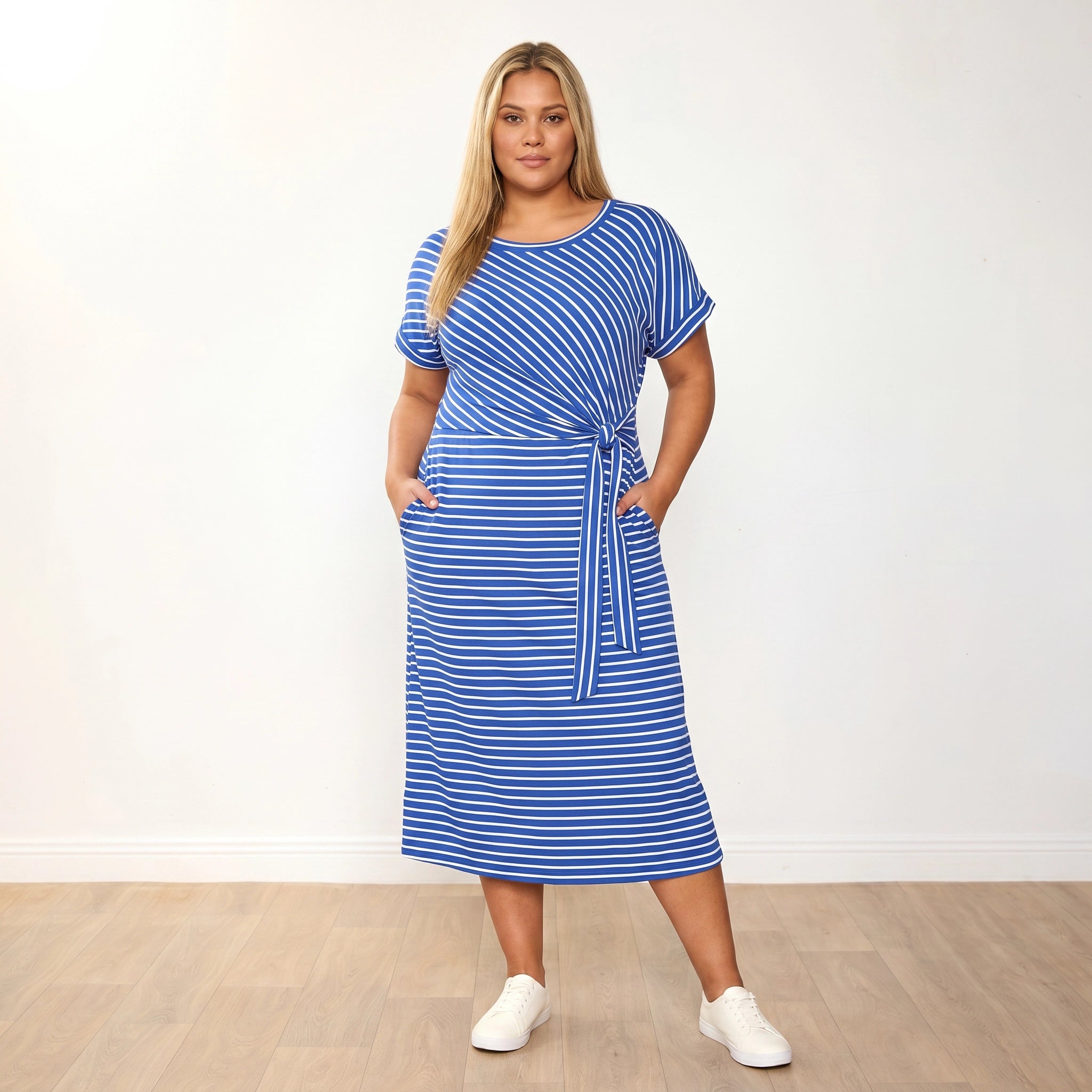 Muriel Dress (Cobalt Stripe) - Eliza plus size model, front hands in pockets