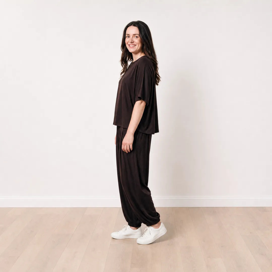 Róisín wearing the Orla Co-Ord in Chocolate Brown, smiling side profile