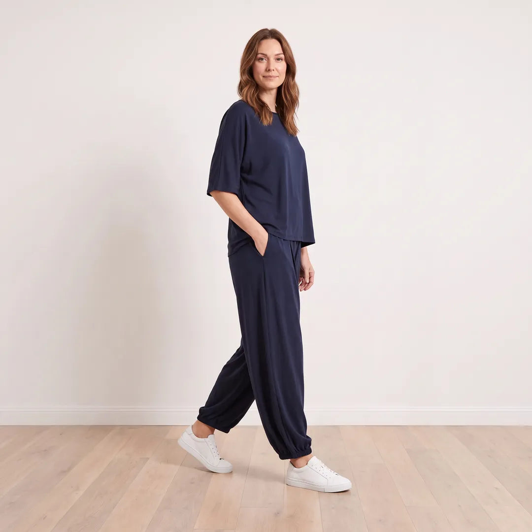 Orla Co-Ord in Navy on T_Aisling, cheerful walking three-quarter view