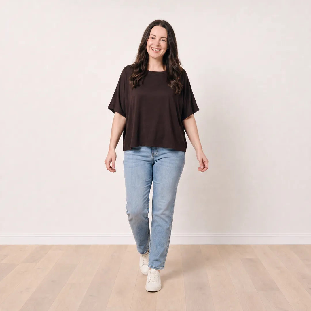 Orla Top in chocolate brown styled with light-wash straight-leg jeans, walking view